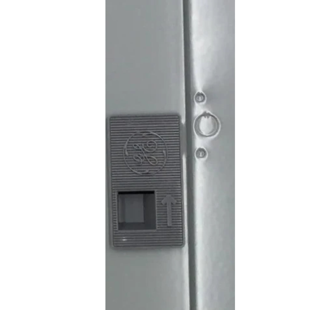 Knockout holes in panel trim for TDL106 lock