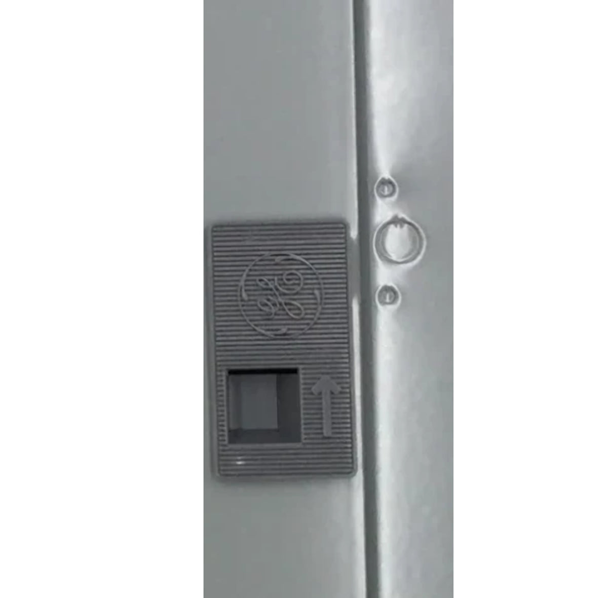 Knockout holes in panel trim for TDL106 lock